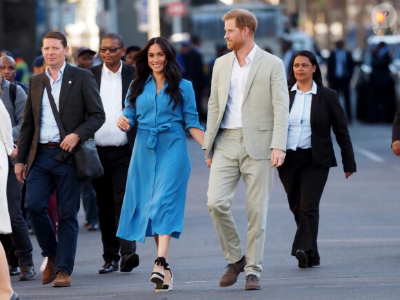 Le prince Harry, duc de Sussex, et Meghan Markle, duchesse de Sussex, en visite dans le District 6 au Cap dans le cadre de leur visite officielle en Afrique du Sud, le 23 septembre 2019.