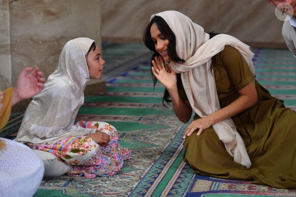 Meghan Markle, duchesse de Sussex, et le prince Harry ont visité la mosquée Auwal, la plus ancienne d'Afrique du Sud, dans le quartier de Bo-Kaap au Cap, le 24 septembre 2019 dans le cadre de leur visite officielle et de l'Heritage Day, un jour férié dans le pays.