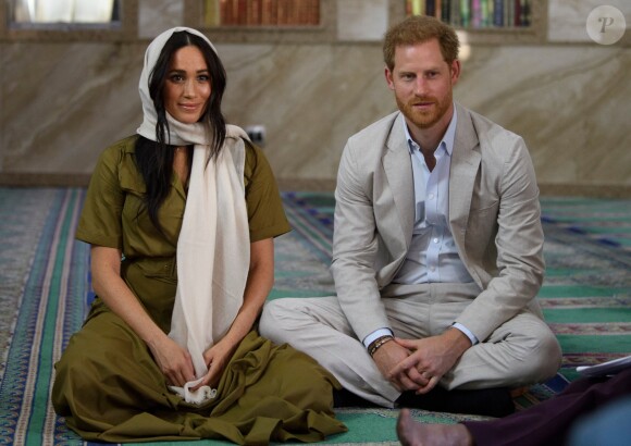 Meghan Markle, duchesse de Sussex, et le prince Harry ont visité la mosquée Auwal, la plus ancienne d'Afrique du Sud, dans le quartier de Bo-Kaap au Cap, le 24 septembre 2019 dans le cadre de leur visite officielle et de l'Heritage Day, un jour férié dans le pays.