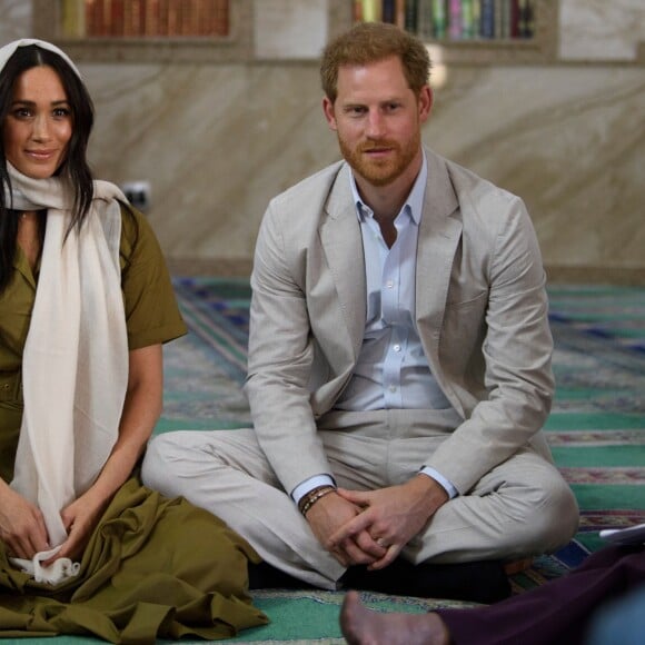 Meghan Markle, duchesse de Sussex, et le prince Harry ont visité la mosquée Auwal, la plus ancienne d'Afrique du Sud, dans le quartier de Bo-Kaap au Cap, le 24 septembre 2019 dans le cadre de leur visite officielle et de l'Heritage Day, un jour férié dans le pays.