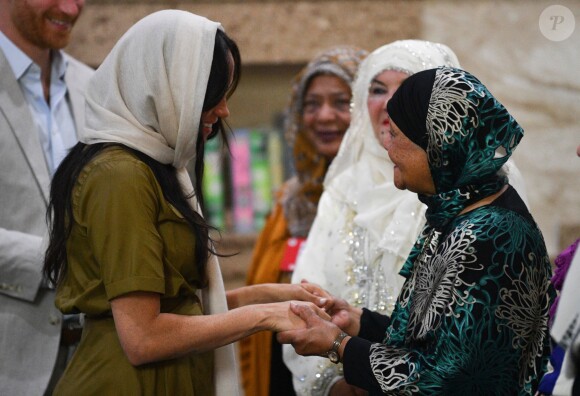 Meghan Markle, duchesse de Sussex, et le prince Harry ont visité la mosquée Auwal, la plus ancienne d'Afrique du Sud, dans le quartier de Bo-Kaap au Cap, le 24 septembre 2019 dans le cadre de leur visite officielle et de l'Heritage Day, un jour férié dans le pays.