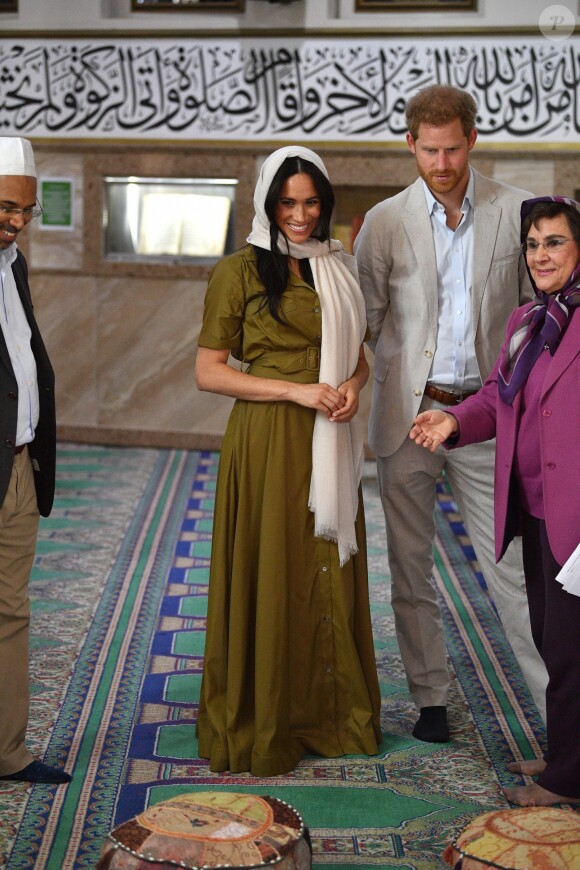 Meghan Markle, duchesse de Sussex, et le prince Harry ont visité la mosquée Auwal, la plus ancienne d'Afrique du Sud, dans le quartier de Bo-Kaap au Cap, le 24 septembre 2019 dans le cadre de leur visite officielle et de l'Heritage Day, un jour férié dans le pays.