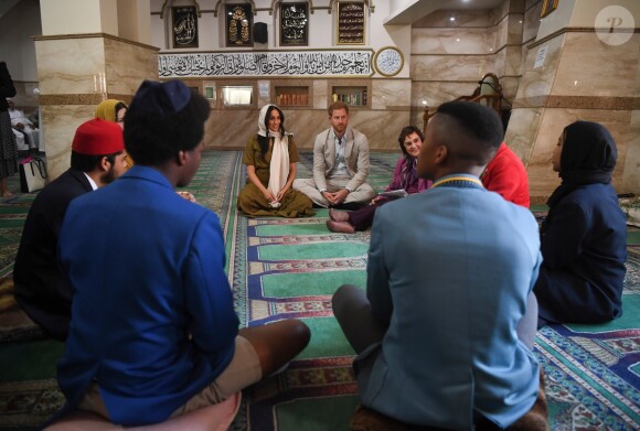 Meghan Markle, duchesse de Sussex, et le prince Harry ont visité la mosquée Auwal, la plus ancienne d'Afrique du Sud, dans le quartier de Bo-Kaap au Cap, le 24 septembre 2019 dans le cadre de leur visite officielle et de l'Heritage Day, un jour férié dans le pays.