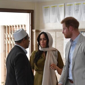 Meghan Markle, duchesse de Sussex, et le prince Harry ont visité la mosquée Auwal, la plus ancienne d'Afrique du Sud, dans le quartier de Bo-Kaap au Cap, le 24 septembre 2019 dans le cadre de leur visite officielle et de l'Heritage Day, un jour férié dans le pays.