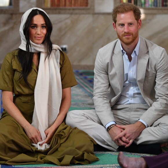 Meghan Markle, duchesse de Sussex, et le prince Harry ont visité la mosquée Auwal, la plus ancienne d'Afrique du Sud, dans le quartier de Bo-Kaap au Cap, le 24 septembre 2019 dans le cadre de leur visite officielle et de l'Heritage Day, un jour férié dans le pays.