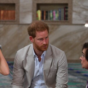 Meghan Markle, duchesse de Sussex, et le prince Harry ont visité la mosquée Auwal, la plus ancienne d'Afrique du Sud, dans le quartier de Bo-Kaap au Cap, le 24 septembre 2019 dans le cadre de leur visite officielle et de l'Heritage Day, un jour férié dans le pays.