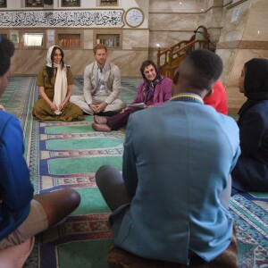 Meghan Markle, duchesse de Sussex, et le prince Harry ont visité la mosquée Auwal, la plus ancienne d'Afrique du Sud, dans le quartier de Bo-Kaap au Cap, le 24 septembre 2019 dans le cadre de leur visite officielle et de l'Heritage Day, un jour férié dans le pays.