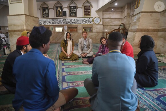 Meghan Markle, duchesse de Sussex, et le prince Harry ont visité la mosquée Auwal, la plus ancienne d'Afrique du Sud, dans le quartier de Bo-Kaap au Cap, le 24 septembre 2019 dans le cadre de leur visite officielle et de l'Heritage Day, un jour férié dans le pays.