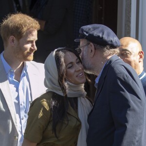 Meghan Markle, duchesse de Sussex, et le prince Harry ont visité la mosquée Auwal, la plus ancienne d'Afrique du Sud, dans le quartier de Bo-Kaap au Cap, le 24 septembre 2019 dans le cadre de leur visite officielle et de l'Heritage Day, un jour férié dans le pays.