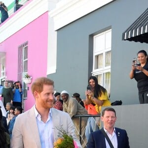 Meghan Markle, duchesse de Sussex, et le prince Harry en visite dans le quartier de Bo-Kaap au Cap, le 24 septembre 2019 dans le cadre de leur visite officielle et de l'Heritage Day, un jour férié dans le pays.