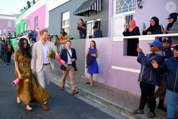 Meghan Markle, duchesse de Sussex, et le prince Harry en visite dans le quartier de Bo-Kaap au Cap, le 24 septembre 2019 dans le cadre de leur visite officielle et de l'Heritage Day, un jour férié dans le pays.