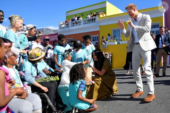 Meghan Markle, duchesse de Sussex, et le prince Harry en visite dans le quartier de Bo-Kaap au Cap, le 24 septembre 2019 dans le cadre de leur visite officielle et de l'Heritage Day, un jour férié dans le pays.