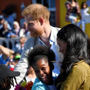 Meghan Markle, duchesse de Sussex, et le prince Harry en visite dans le quartier de Bo-Kaap au Cap, le 24 septembre 2019 dans le cadre de leur visite officielle et de l'Heritage Day, un jour férié dans le pays.