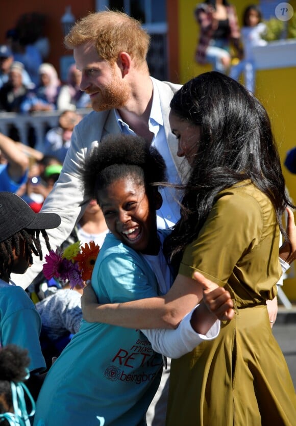 Meghan Markle, duchesse de Sussex, et le prince Harry en visite dans le quartier de Bo-Kaap au Cap, le 24 septembre 2019 dans le cadre de leur visite officielle et de l'Heritage Day, un jour férié dans le pays.