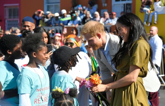 Meghan Markle, duchesse de Sussex, et le prince Harry en visite dans le quartier de Bo-Kaap au Cap, le 24 septembre 2019 dans le cadre de leur visite officielle et de l'Heritage Day, un jour férié dans le pays.