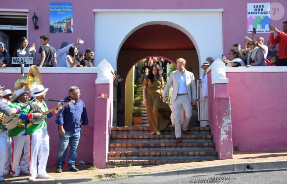Meghan Markle, duchesse de Sussex, et le prince Harry en visite dans le quartier de Bo-Kaap au Cap, le 24 septembre 2019 dans le cadre de leur visite officielle et de l'Heritage Day, un jour férié dans le pays.