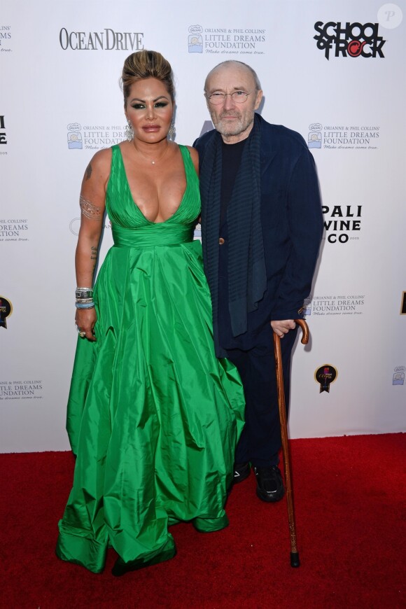 Phil Collins avec sa femme Orianne au photocall de la soirée de gala "Dreaming on the Beach" à Miami, le 15 novembre 2018.