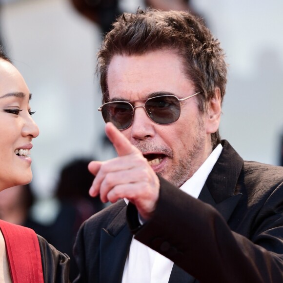 Gong Li et son compagnon Jean-Michel Jarre - Tapis rouge du film "Lan Xin Da Ju Yuan" (Saturday Fiction) lors du 76ème festival international du film de Venise, la Mostra, le 6septembre 2019.