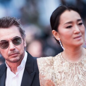 Jean-Michel Jarre et sa compagne Gong Li (robe Elie Saab)- Montée des marches du film "Douleur et Gloire" lors du 72ème Festival International du Film de Cannes. Le 17 mai 2019 © Jacovides-Moreau / Bestimage