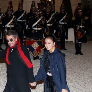 Jean-Michel Jarre et sa compagne Gong Li - Dîner d'Etat du président de la République française en l'honneur du président de la République populaire de Chine lors de sa visite d'Etat en France du 24 au 26 mars 2019, au Palais de l'Elysée, à Paris, France, le 25 mars 2019. © Dominique Jacovides/Bestimage