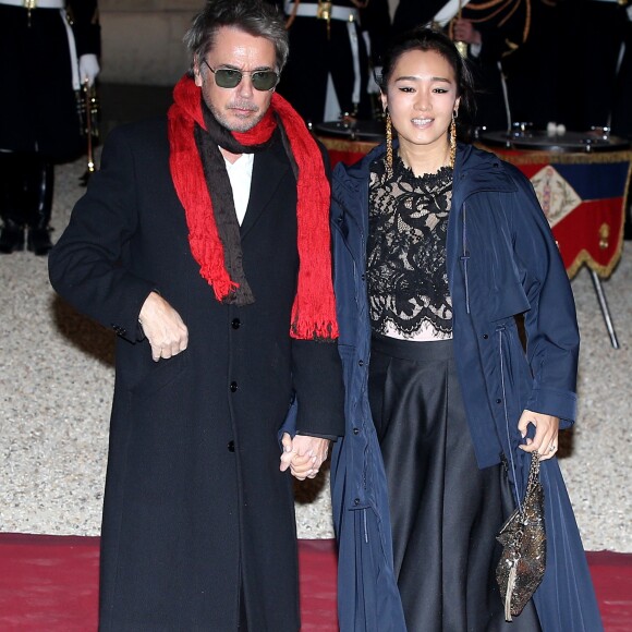 Jean-Michel Jarre et sa compagne Gong Li - Dîner d'Etat du président de la République française en l'honneur du président de la République populaire de Chine lors de sa visite d'Etat en France du 24 au 26 mars 2019, au Palais de l'Elysée, à Paris, France, le 25 mars 2019. © Dominique Jacovides/Bestimage