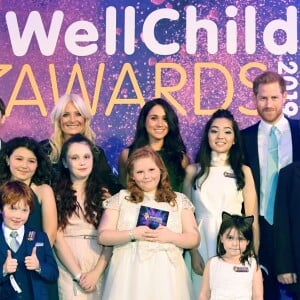 Le prince Harry, duc de Sussex, et Meghan Markle, duchesse de Sussex, lors du "WellChild Awards" à l'hôtel Royal Lancaster à Londres. Le 15 octobre 2019