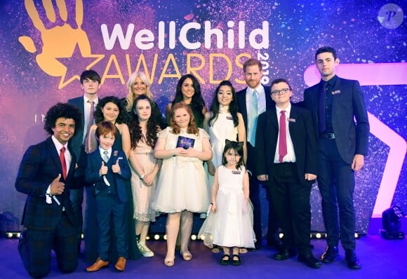 Le prince Harry, duc de Sussex, et Meghan Markle, duchesse de Sussex, lors du "WellChild Awards" à l'hôtel Royal Lancaster à Londres. Le 15 octobre 2019