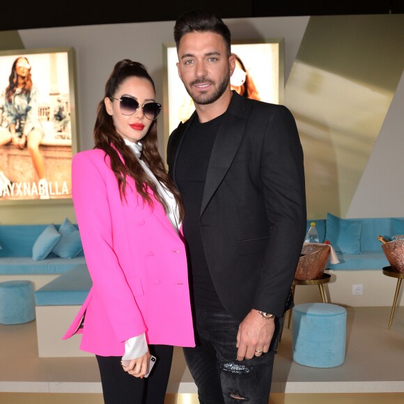 Nabilla Benattia (enceinte) et son mari Thomas Vergara - Nabilla Benattia présente sa collaboration pour les lunettes Quay Australia sur la plage Magnun lors du 72ème Festival International du Film de Cannes, le 18 mai 2019. ©Veeren / Bestimage