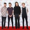 Liam Payne, Louis Tomlinson, Harry Styles et Niall Horan (du groupe One Direction) à la Soirée des BBC Music Awards 2015 à Birmingham. Le 10 décembre 2015.