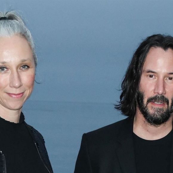 Keanu Reeves et sa compagne Alexandra Grant au défilé Saint Laurent, collection homme printemps-été 2020 à Malibu le 6 juin 2019.