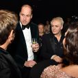 Le prince William, duc de Cambridge entouré de Nick Rhodes et John Taylor du groupe Duran Duran (groupe préféré de la princesse Diana) lors d'un gala à l'occasion du 50ème anniversaire de Centrepoint, à la Roundhouse de Camden, dans le nord de Londres, le 13 novembre 2019.