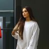 Ariana Grande se promène avec une amie à New York, le 16 août 2018.