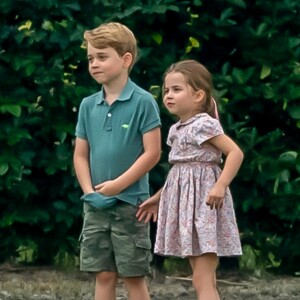 Le prince George de Cambridge et sa soeur la princesse Charlotte de Cambridge lors d'un match de polo de bienfaisance King Power Royal Charity Polo Day à Wokinghan, comté de Berkshire, Royaume Uni, le 10 juillet 2019.