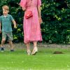 Catherine (Kate) Middleton, duchesse de Cambridge avec ses enfants, le prince George de Cambridge et le prince Louis de Cambridge lors d'un match de polo de bienfaisance King Power Royal Charity Polo Day à Wokinghan, comté de Berkshire, Royaume Uni, le 10 juillet 2019.