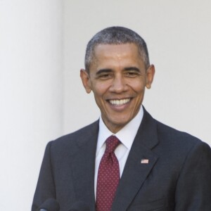 Barack Obama entouré de ses deux filles, Natasha et Malia.