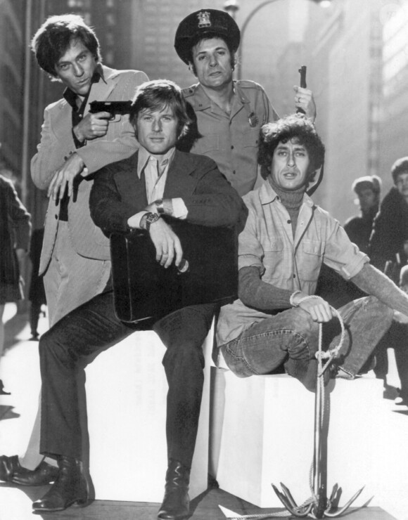 Robert Redford, George Segal, Ron Leibman et Paul Sand sur le tournage de "The Hot Rock" à Santa Monica, Californie, en 1971.
