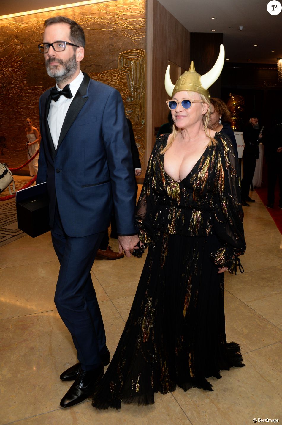 Patricia Arquette et son compagnon Eric White à la sortie de la 77ème cérémonie annuelle des Golden Globe Awards à l&#039;hôtel Beverly Hilton à Los Angeles, Californie, Etats-Unis, le 5 janvier 2020.