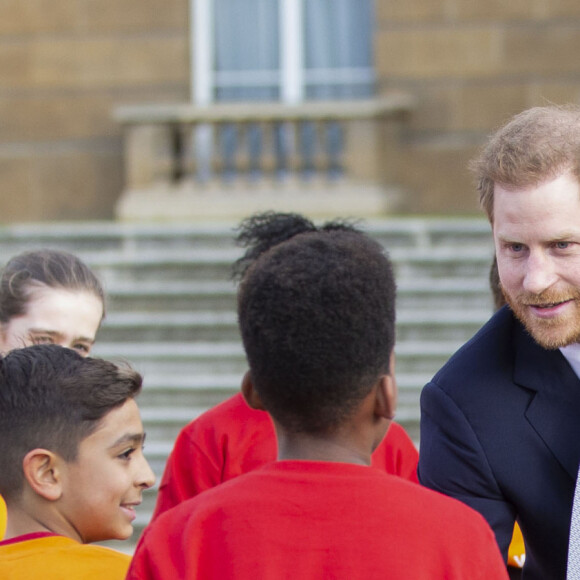 Première apparition publique une semaine après l'annonce de sa mise en retrait de la monarchie britannique avec sa femme du prince Harry, duc de Sussex, qui préside jeudi le tirage au sort de la Coupe du monde de rugby à XIII 2021 pour les tournois masculins, féminins et en fauteuil roulant au palais de Buckingham, à Londres, Royaume Uni, le 16 janvier 2020.