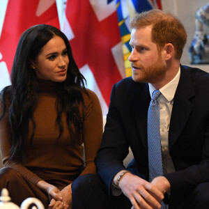 Meghan Markle, duchesse de Sussex, et le prince Harry, duc de Sussex, le 7 janvier 2020 lors de leur visite à la Maison du Canada à Londres suite à leur séjour outre-Atlantique dans les semaines précédentes.