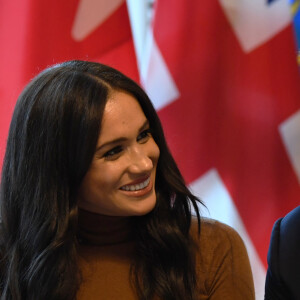 Meghan Markle, duchesse de Sussex, et le prince Harry, duc de Sussex, le 7 janvier 2020 lors de leur visite à la Maison du Canada à Londres suite à leur séjour outre-Atlantique dans les semaines précédentes.