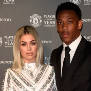 Anthony Martial et sa femme Mélanie Da Cruz lors de la soirée du prix du joueur de l'année de Manchester United 2019 au stade Old Trafford à Manchester, Royaume Uni, le 9 mai 2019.