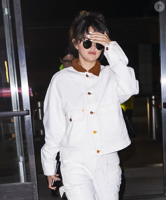 Selena Gomez arrive à l'aéroport JFK. New York. Le 15 janvier 2020. @Jackson Lee/Splash News/ABACAPRESS.COM