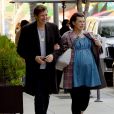  Exclusif - Milla Jovovich (enceinte) et son mari Paul W. S. Anderson se rendent au restaurant Spago à Beverly Hills le 21 janvier 2020. 