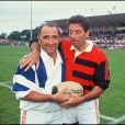 Archives- Claude Brasseur et Michel Creton au starde de rugby de Biarritz, le 31 août 1992.  