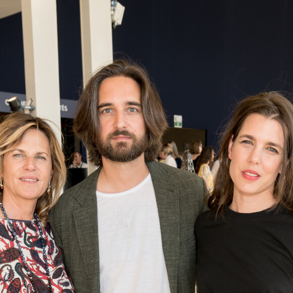 Exclusif - Virginie Coupérie Eiffel (Présidente de Paris Eiffel Jumping), Dimitri Rassam, sa femme Charlotte Casiraghi dans la tente VIP lors du Longines Paris Eiffel Jumping au Champ de Mars à Paris, le samedi 6 juillet 2019. © Luc Castel/Bestimage