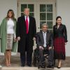 Melania Trump et son mari, le président Donald Trump, avec le président de l'Equateur Lenín Moreno et son épouse Rocio Gonzales De Moreno devant la Maison Blanche, le 12 février 2020.