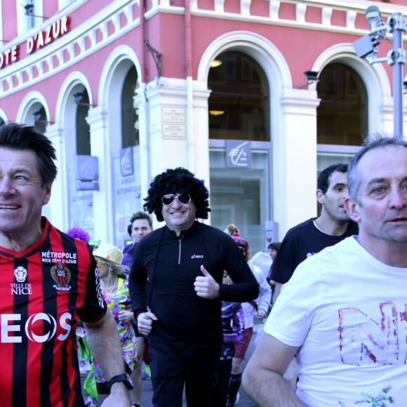 Semi exclusif - Christian Estrosi, le maire de Nice et sa femme Laura Tenoudji participent au jogging du Carnaval de Nice sur la promenade des Anglais à Nice, le 15 février 2020. Tous les participants sont déguisés. © Bruno Bebert / Bestimage Semi exclusive - Christian Estrosi, the mayor of Nice and his wife Laura Tenoudji take part ro the Nice Carnival jogging on the Promenade des Anglais in Nice, February 15, 2020. All participants are in disguise.15/02/2020 - Nice