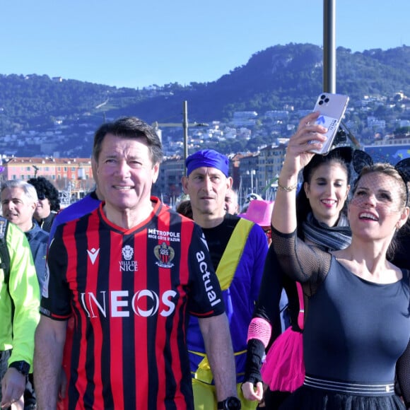 Semi exclusif - Christian Estrosi, le maire de Nice et sa femme Laura Tenoudji participent au jogging du Carnaval de Nice sur la promenade des Anglais à Nice, le 15 février 2020. Tous les participants sont déguisés. © Bruno Bebert / Bestimage Semi exclusive - Christian Estrosi, the mayor of Nice and his wife Laura Tenoudji take part ro the Nice Carnival jogging on the Promenade des Anglais in Nice, February 15, 2020. All participants are in disguise.15/02/2020 - Nice