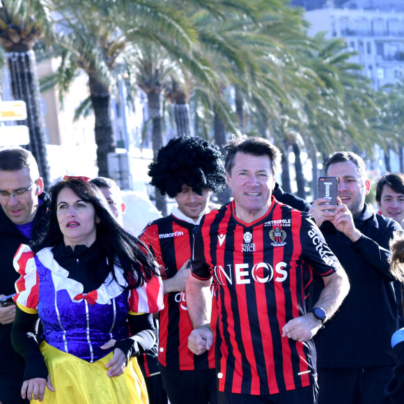 Semi exclusif - Christian Estrosi, le maire de Nice et sa femme Laura Tenoudji participent au jogging du Carnaval de Nice sur la promenade des Anglais à Nice, le 15 février 2020. Tous les participants sont déguisés. © Bruno Bebert / Bestimage Semi exclusive - Christian Estrosi, the mayor of Nice and his wife Laura Tenoudji take part ro the Nice Carnival jogging on the Promenade des Anglais in Nice, February 15, 2020. All participants are in disguise.15/02/2020 - Nice