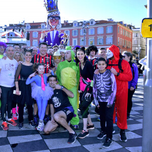 Semi exclusif - Christian Estrosi, le maire de Nice et sa femme Laura Tenoudji participent au jogging du Carnaval de Nice sur la promenade des Anglais à Nice, le 15 février 2020. Tous les participants sont déguisés. © Bruno Bebert / Bestimage Semi exclusive - Christian Estrosi, the mayor of Nice and his wife Laura Tenoudji take part ro the Nice Carnival jogging on the Promenade des Anglais in Nice, February 15, 2020. All participants are in disguise.15/02/2020 - Nice